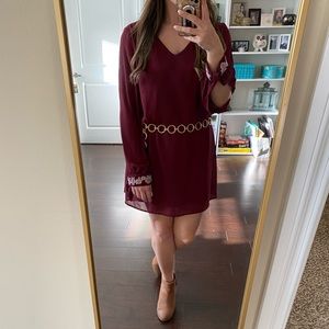 Maroon dress with embroidered sleeve cuff